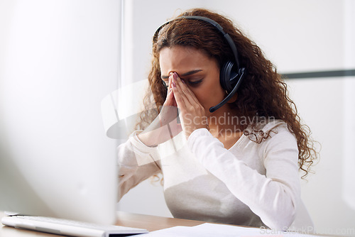 Image of Call center, headache and woman with stress for computer problem, burnout and brain fog for consulting. Tired female telemarketing consultant at desktop with crisis, anxiety and bad customer service