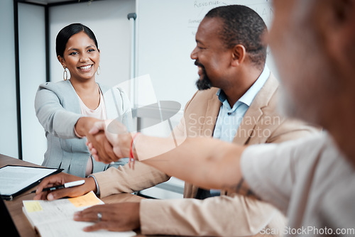 Image of Happy, business people and handshake for meeting, agreement or b2b deal in partnership at the office. Woman employee shaking hands with businessman for teamwork, welcome or introduction at workplace