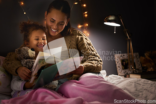 Image of Night, book and mother with daughter in bedroom for storytelling, fantasy and creative. Education, learning and love with woman reading to young girl in family home for bedtime, literature and relax