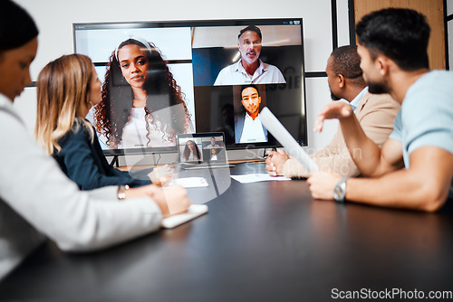Image of Video call, meeting and strategy with a business team in the boardroom for a virtual conference or workshop. Management, webinar and planning with a group of corporate colleagues in an office at work