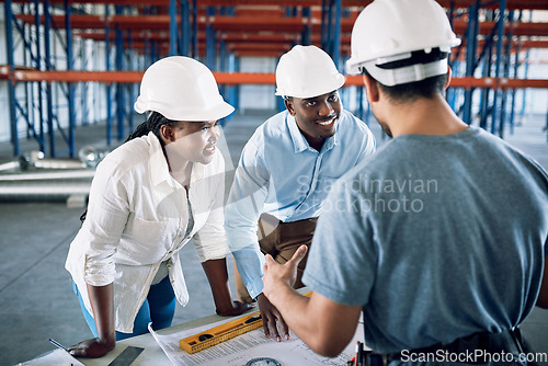 Image of People, architect and blueprint in team construction, planning or architecture layout on site. Engineer group or contractor in meeting discussion on floor plan, brainstorming or building strategy