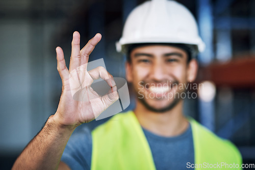 Image of Happy man, architect and hands with okay sign for construction success or good job on site. Hand of male person, engineer or contractor showing OK emoji, yes or perfect gesture for architecture