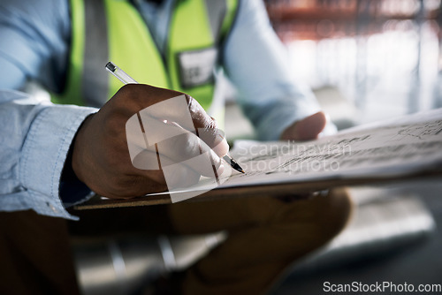 Image of Man, architect and hands writing on checklist for inventory, inspection or construction paperwork on site. Hand of male contractor working on documents for planning, architecture or idea strategy