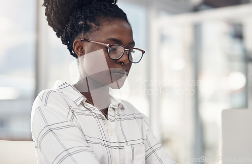 Image of Professional, woman and focus on laptop for entrepreneurship in Africa on the internet. Female employee, reading and computer screen for company with technology and glasses for digital design.