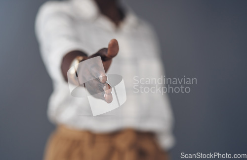 Image of Handshake, success and offer of business woman isolated on a studio background for agreement, introduction or welcome. Professional person shaking hands in pov meeting, deal or career congratulations