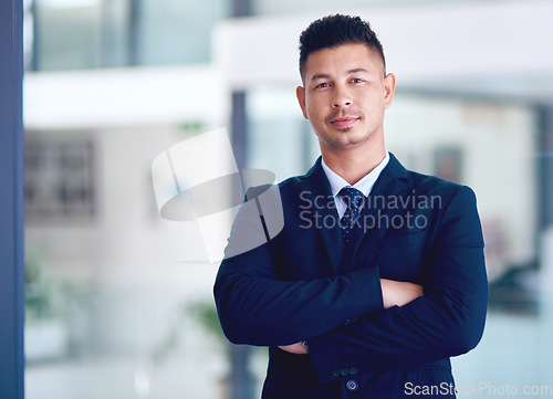 Image of Business man, office portrait and arms crossed with company vision, management and motivation. Success, male employee and professional lawyer in a law firm with corporate job pride and confidence