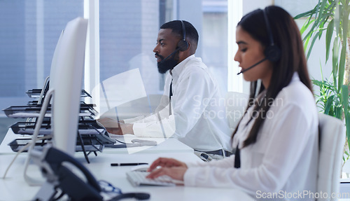 Image of Call center, computer and consulting of business people in office for customer service, technical support or networking. Advice, contact us and help desk with employees for advisory, solution or sale