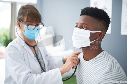 Image of Doctor, exam and woman with patient listening to heart, breathing or medical healthcare test for covid in hospital. Clinic, black man and corona mask or sick person, check health with stethoscope