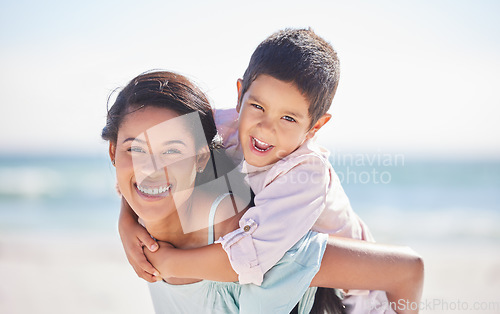 Image of Piggyback, mother or portrait of kid on beach together on a fun summer holiday vacation with smile. Affection, lovely parent or happy boy child bonding or hugging mom at sea or nature on weekend trip