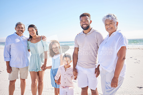 Image of Happy family, grandparents portrait or children at sea holding hands to relax on holiday together. Dad, mom or kids siblings love bonding or smiling with grandmother or grandfather on beach sand