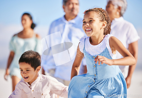 Image of Excited, beach or happy kids running or playing in summer with happiness, joy or wellness in nature. Children, lovely girl or young boy bonding with a happy girl or playful sister walking together