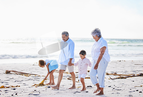 Image of Beach, grandparents or happy children holding hands, walking or smiling as a family in nature. Grandmother, senior grandfather or young kids siblings bonding or taking walk together at sea