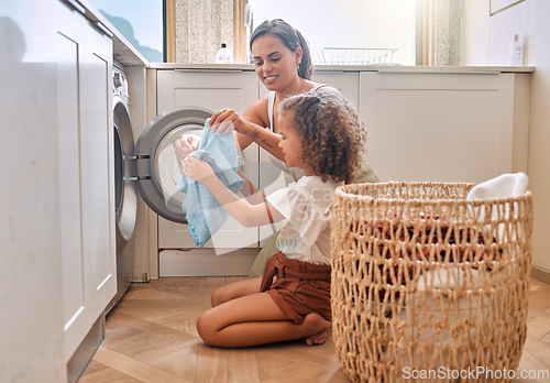 Image of Happy, laundry and washing machine with mother and daughter for helping, learning and cleaner. Housekeeping, teamwork and basket with woman and young girl in family home for teaching and cleaning