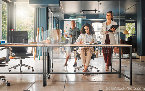 Image of Business women, fashion designer team and office with planning at a design company. Creative management, working and female staff in a conversation and meeting for teamwork and strategy in workplace