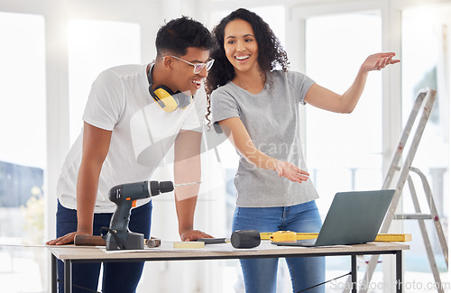 Image of Maintenance, renovation and laptop with a couple in their new house together for a remodeling project. Construction, real estate or property improvement with a man and woman planning for home diy