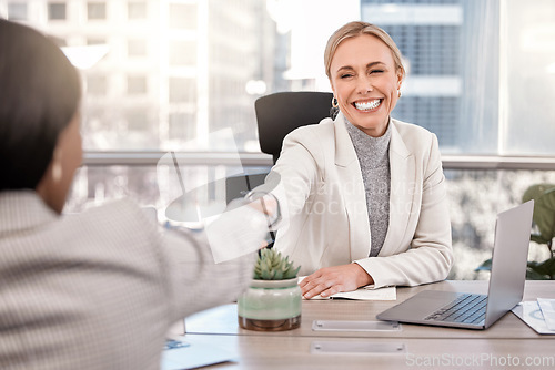 Image of Smile, businesswoman and shake hands or interview for new job or hired and in the office. Partnership, human resource and female worker meeting or staff agreement or approve and team in the workplace