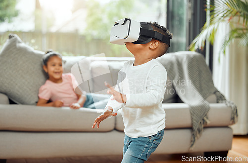 Image of Young boy with VR goggles, gaming and metaverse with futuristic tech, child experience simulation at family home. Male kid in living room with video games, virtual reality and future technology