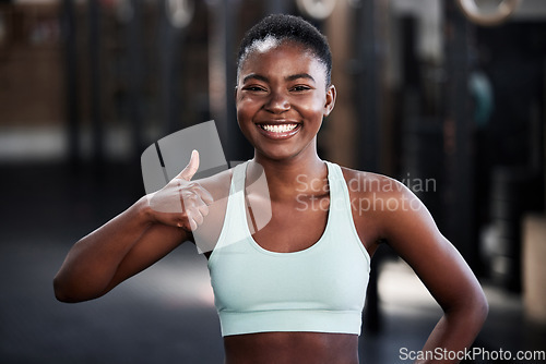 Image of Sports, black woman and athlete with thumbs for gym success or happy workout and isolated. Fitness, train and African female runner or smile or yes for health and motivation for winning on mock up