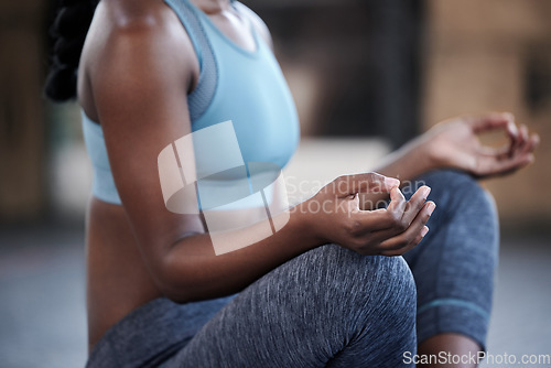 Image of Hands, gym or woman in yoga meditation lotus pose for awareness development or healthy wellness. Chakra closeup, mudras or calm girl sitting for exercise, workout or training in zen fitness studio