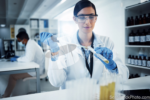 Image of Research, experiment and woman scientist in laboratory with chemical, sample or analysis. Healthcare, analytics and lady expert with liquid for vaccine, cure or futuristic innovation or solution