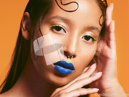 Image of Makeup, neon cosmetic and portrait of woman in studio for cosmetics, eye shadow art and beauty. Creative color, aesthetic and face of female person with blue lipstick for glamour, fashion and style