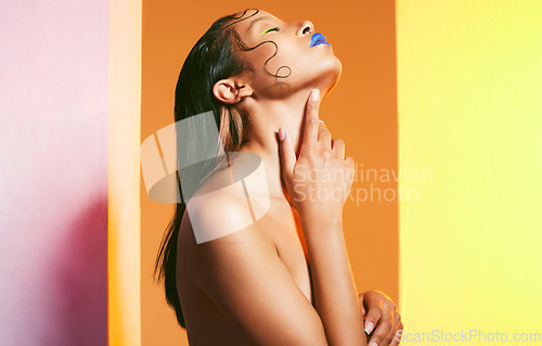 Image of Makeup, beauty aesthetic and woman in studio for cosmetics, eye shadow and style on color background. Satisfaction, cosmetology and female person with blue lipstick for glamour, fashion and art deco