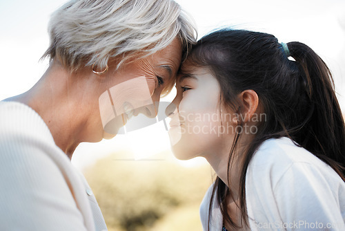 Image of Grandmother, girl and close with happiness in nature with love in outdoor with family and sun. Kid, grandma and noses with smile and loving in the garden with bonding together on the weekend for joy.