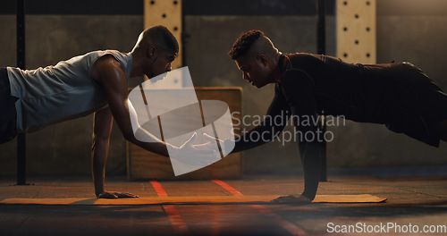 Image of Fitness, high five and men with floor push up at a gym for support, motivation and training goals. Team, handshake and man with personal trainer for weight training, performance and workout routine