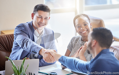 Image of Business people, handshake and applause in meeting for partnership, b2b agreement or hiring at office. Happy group of employees shaking hands and clapping in recruitment, teamwork or corporate growth