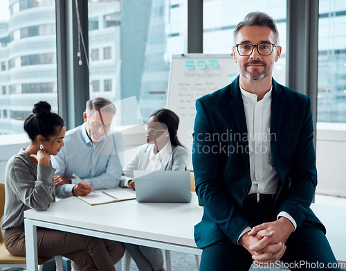 Image of Portrait, leadership and business man, ceo or entrepreneur in office meeting, company and team. Corporate professional, executive and mature manager with confidence, pride and working with experience