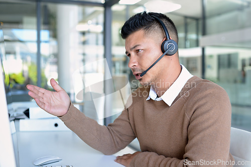 Image of Man, callcenter with phone call and CRM, contact us and communication with headset in office. Male consultant in customer service, telemarketing or tech support with help desk job, advice and telecom