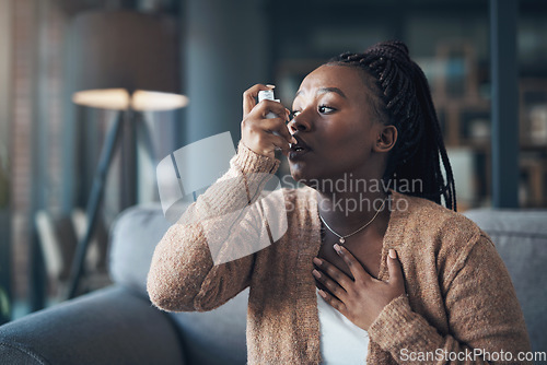 Image of Asthma attack, medicine and a woman with inhaler to breathe in a house for health and wellness. Anxiety of a sick black person with medication for healthcare, lungs or chest and respiratory problem