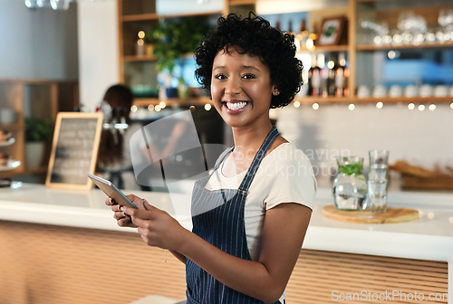 Image of Happy woman, tablet and portrait of waitress at cafe for order, inventory or checking stock at restaurant. Female person, barista or employee on technology in small business management at coffee shop