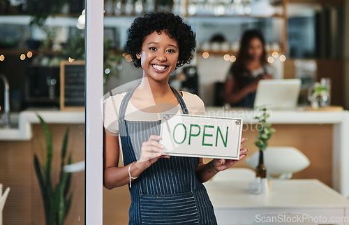 Image of Happy woman, open sign and portrait at cafe of waitress or small business owner for morning or ready to serve. African female person at restaurant holding board for coffee shop or cafeteria opening