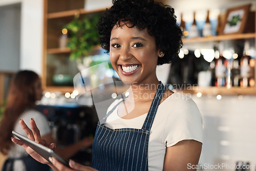 Image of Happy woman, tablet and portrait of waitress at cafe with smile in management, leadership or inventory at restaurant. Female person, barista or employee on technology in small business at coffee shop