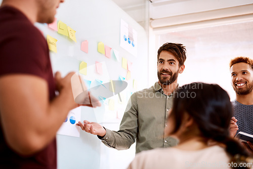 Image of Brainstorming, data and teamwork with man in meeting for strategy, project management or planning. Collaboration, creative and idea with business people in startup for schedule, solution or moodboard