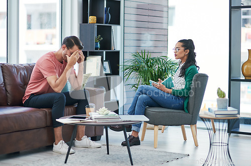 Image of Mental health, therapy or consulting with a woman psychologist and male patient talking in her office. Psychology, wellness and trust with a female doctor or therapist grief counseling a man