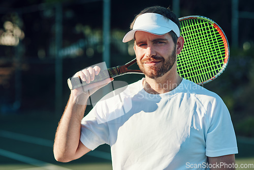 Image of Sports, tennis and portrait of man at court for training, workout and cardio routine. Fitness, face and male player with racket for exercise, challenge and match outdoors with competitive mindset