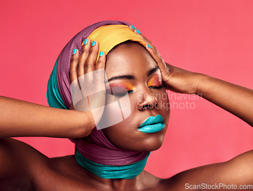 Image of Makeup, beauty and wrap with black woman in studio for creative, art and culture. Fashion, cosmetics and natural with face of model isolated on pink background for african and color mockup
