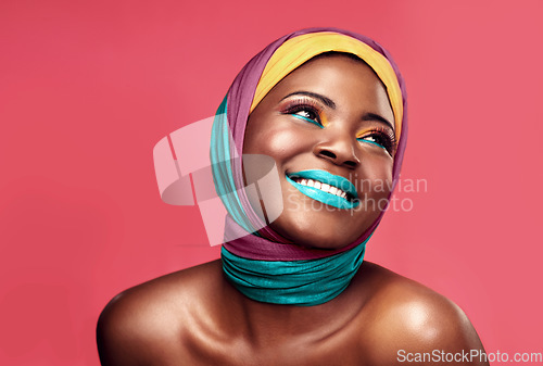 Image of Makeup, beauty and scarf and happy with black woman in studio for creative, art and culture. Fashion, cosmetics and wrap with face of model isolated on pink background for african and color mockup