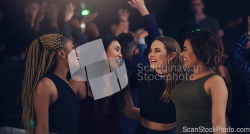 Image of Music, party and night with women in club for dance, celebration and nightlife concert. Festival, disco and happy hour with friends dancing in crowd at social event for energy, techno and dj show