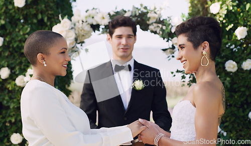 Image of Love, wedding and lgbtq with lesbian couple holding hands for celebration, happy and pride. Gay, spring and marriage ceremony with women at event for commitment, queer sexuality and freedom