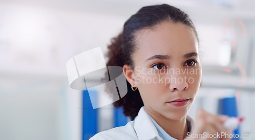 Image of Scientist planning woman writing research on clear board for science formula and data. Laboratory worker, female person and focus with analysis and futuristic vision for medical test with mockup