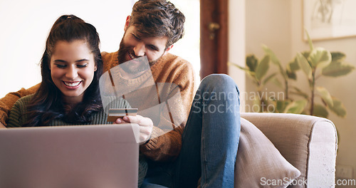 Image of Young couple, credit card and online shopping with virtual wallet or ecommerce or order and sitting on couch at home. Smiling, woman and man using banking service or make secure internet payment