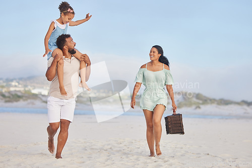 Image of Picnic, parents or kid walking on beach to relax as a happy family on fun summer holiday vacation together. Lovely dad, mother or excited young girl bonding, smiling or holding basket at seashore