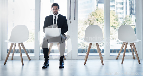 Image of Business man, laptop and waiting room in queue, chair and typing for networking, research or hr recruitment. Businessman, computer and human resources for interview, hiring opportunity or internship