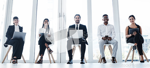 Image of Line, group portrait and people in waiting room with technology and diversity at interview in office. Happy faces, hiring of men and women with business team online for recruitment or human resources