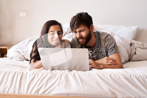 Image of Bedroom laptop, happy and couple reading web info, relationship blog story and scroll on website. Watch video, home bed and relax people doing online shopping, internet search or check social media