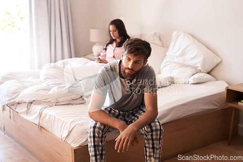 Image of Home bed, man and couple with problem, marriage conflict or stress over mistake, life fail or insomnia. Mental health risk, mistake and person depressed, sad and thinking about divorce in bedroom