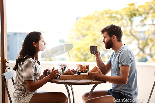 Image of Breakfast food, home and couple argue, fight or angry over relationship problem, mistake or frustrated on apartment balcony. Divorce risk, marriage fail and people in morning conflict during brunch